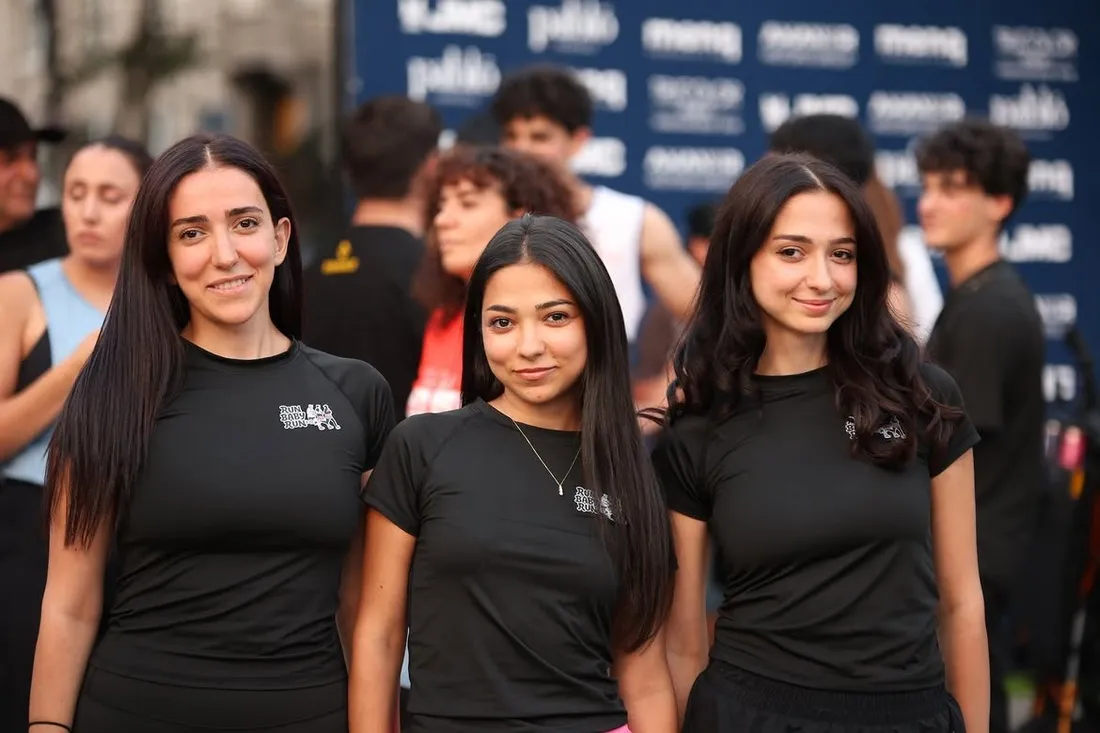 Shaghig, Asdghig and Jebid together in club shirts at a race event